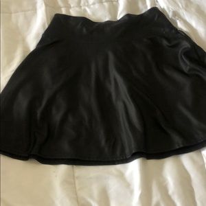 Black leather coated small mini skirt
